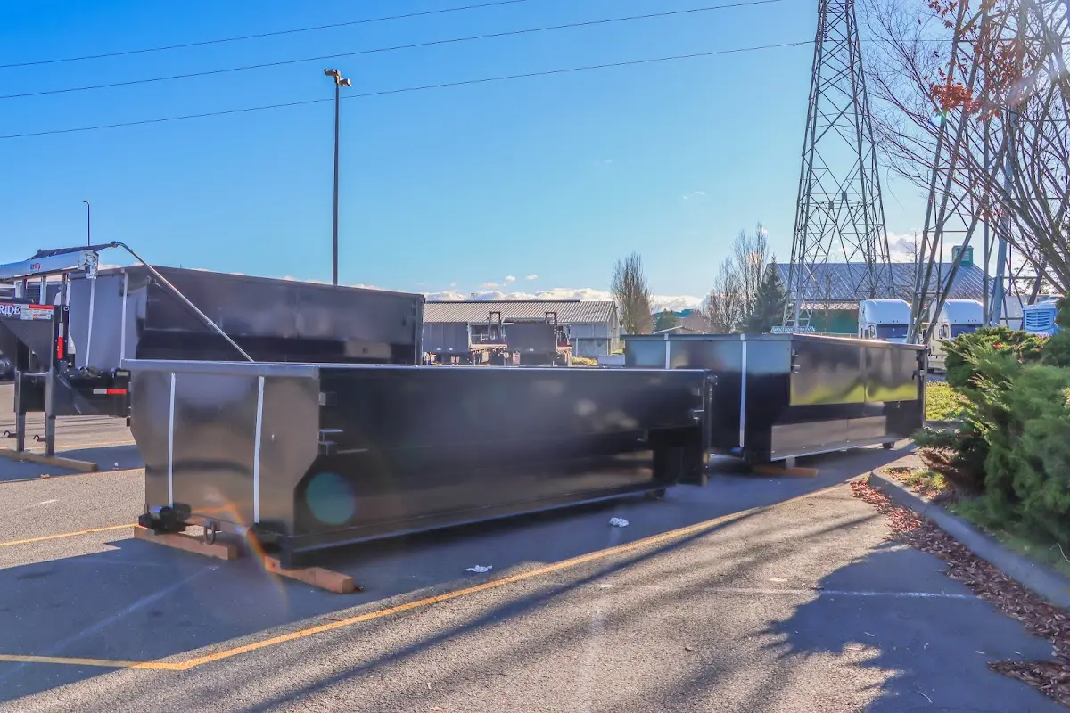 Roll-off dumpster ready for waste disposal at job site for 6 Yard Dumpster Rental in Justice